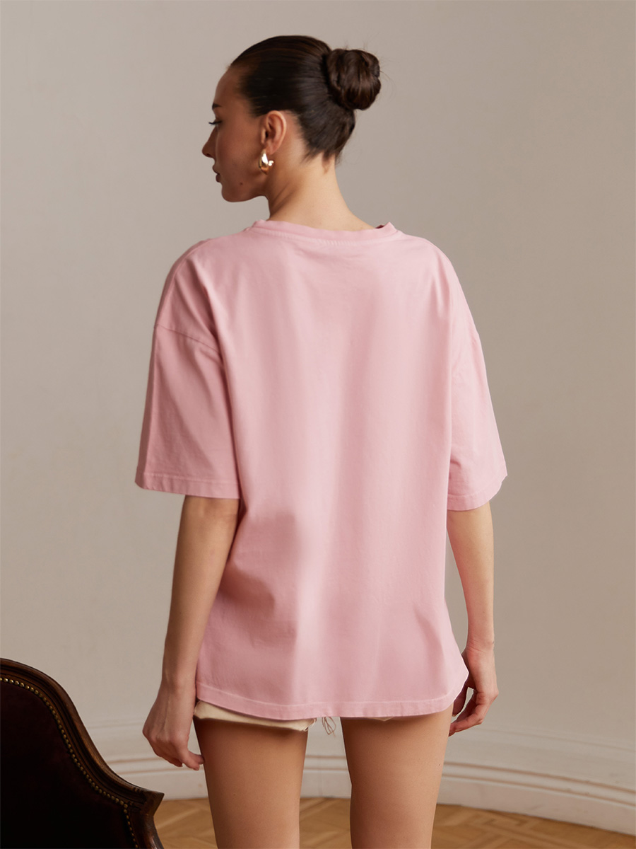 Oversize koszulka w kolorze różowym z nadrukiem z szarych dżetów Money 6 Oversize koszulka w kolorze różowym z nadrukiem z szarych dżetów Money 6